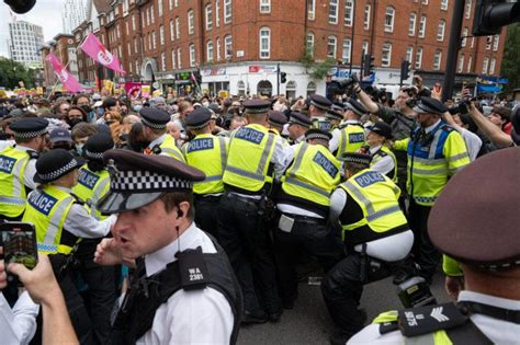 Rival groups clash at protest outside London asylum hotel
