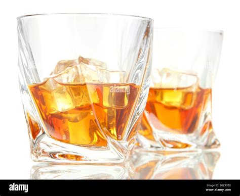 Two glasses of scotch whiskey, isolated on white Stock Photo - Alamy