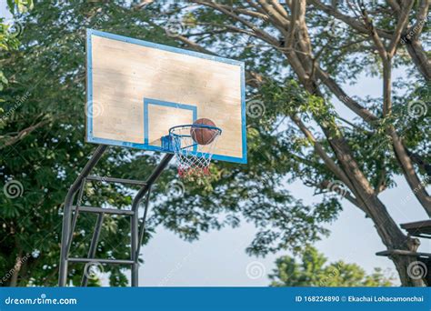 Basketball Goes through the Hoop Stock Photo - Image of goal, flooring ...