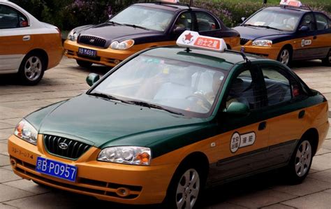北京：定位系统监督电动出租车-中国长安网