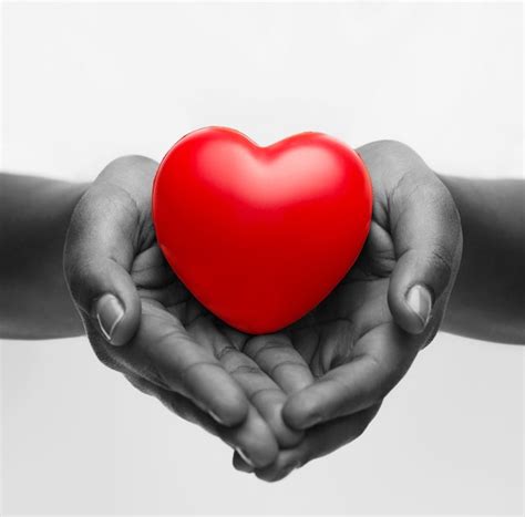 Health, medicine and charity concept - close up of african american ...