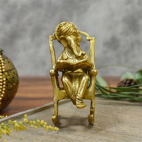 Buy Stylish Brass Rocking Chair Ganesha Online in India - Mypoojabox.in