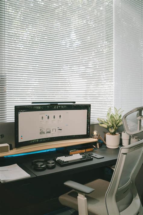 Modern Desk Setup with a Computer · Free Stock Photo