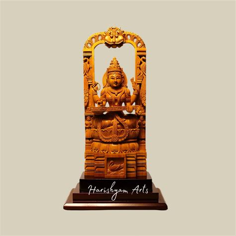 12" Temple Saraswati Wood Sculpture Seated on Kirtimukha Throne Sandal
