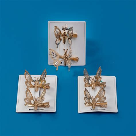 Golden butterfly Hair pins (Set of 2)- UBK2594 – Unboxkar.in