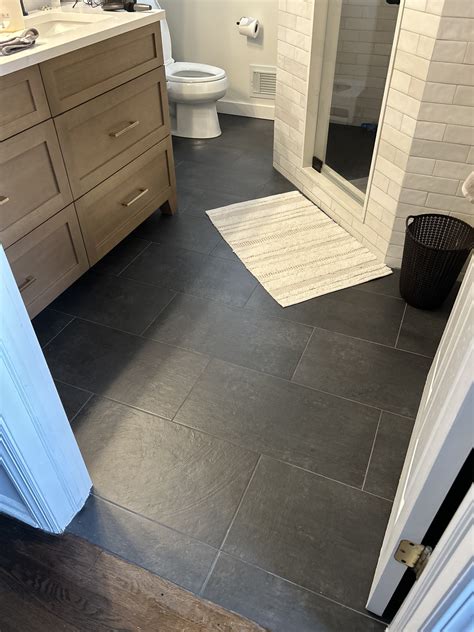 Pin by Missy Meyer on For The Home in 2025 | Black tile bathrooms, Grey ...