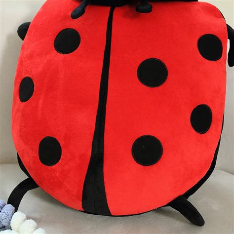 Snuggle Shell Ladybug Wearable Plush Pillow