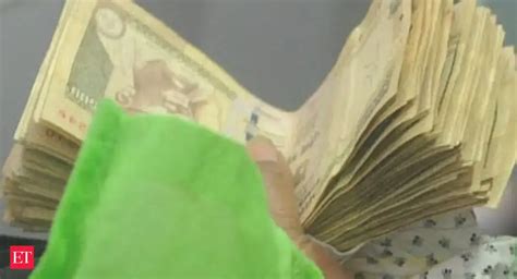 Old notes valid for key utility payments till Nov 24 - The Economic ...