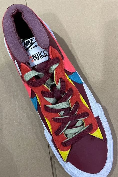 KAWS sacai Nike Blazer Low - www.metrorailnews.in
