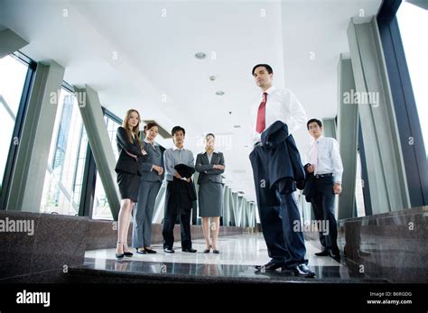 People Standing in an Office HD 的图像结果