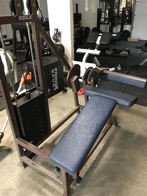 Image result for Hamstring Curl with Weight Machine