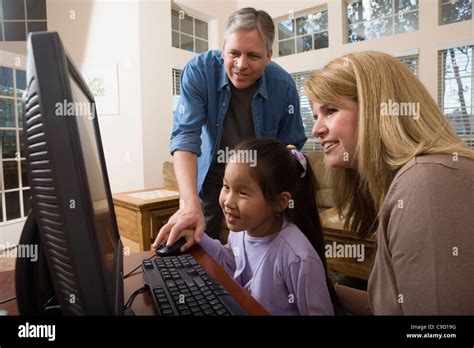 Daughter Using Computer 的图像结果