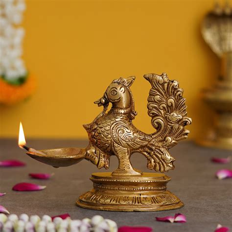 Golden Decorative Handcrafted Peacock Brass Diya Stand – eCraftIndia