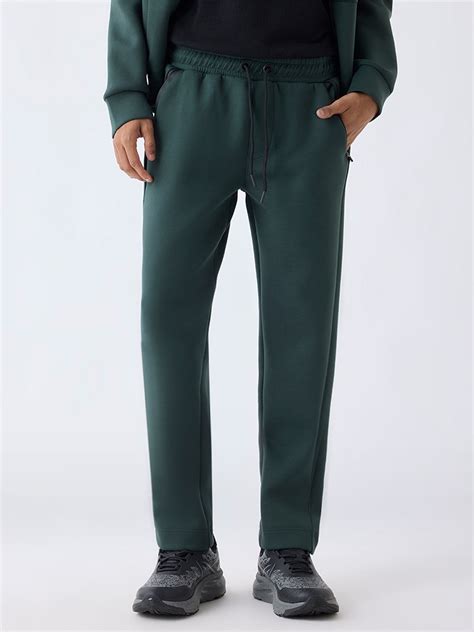 Buy Studiofit Green Solid Relaxed-Fit Mid-Rise Track Pants from Westside