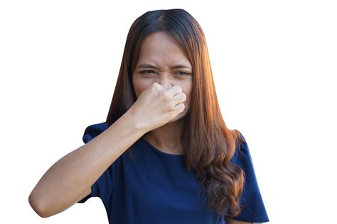 Asian woman covering her nose from bad smell 20951965 PNG