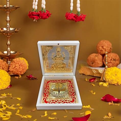 Buy Goddess Laxmi Paduka Gold in White Pocket Temple | Wemy