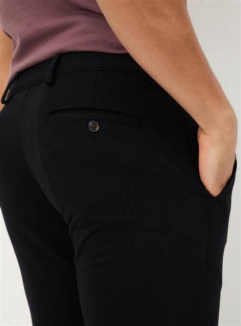 Buy Men Slim Fit Solid Stretch Chinos Online at just Rs. 1499.0 ...