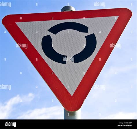 Image result for Red Triangle Roundabout Sign