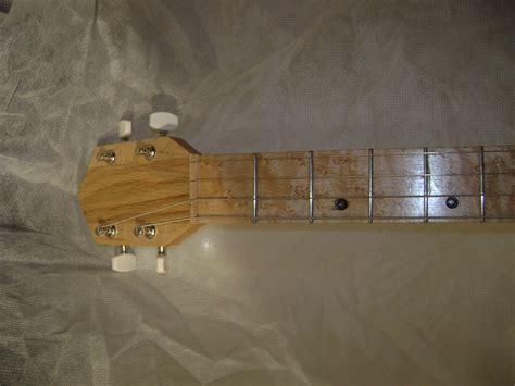 4 String Cigar Box Guitar Lessons 的图像结果