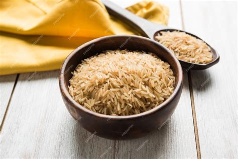 Premium Photo | Stock photo of brown basmati rice in raw form ...