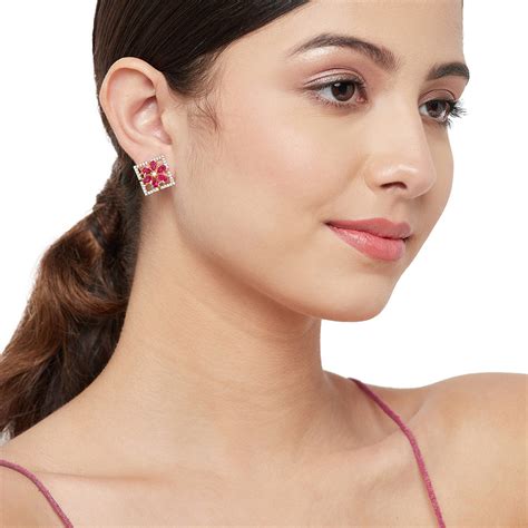 Shimmering Floret American Diamond CZ Gold Plated Brass Stud Earrings ...