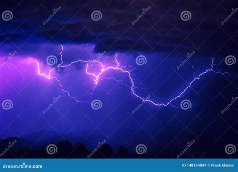Large Colorful Cloud Lightning Streaks Across the Sky in a Storm Stock ...