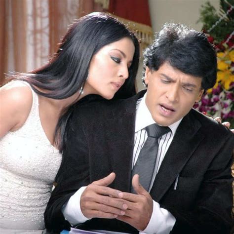 Upendra and Celina Jaitley in a still from the Telugu movie XYZ