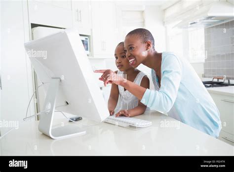 Daughter Using Computer 的图像结果