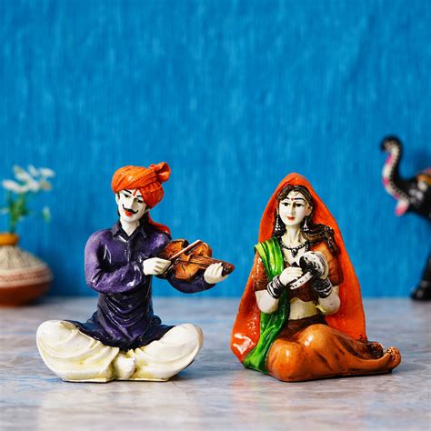 Colorful Combo of Rajasthani Craftsmen and Lady Playing a Musical Inst ...