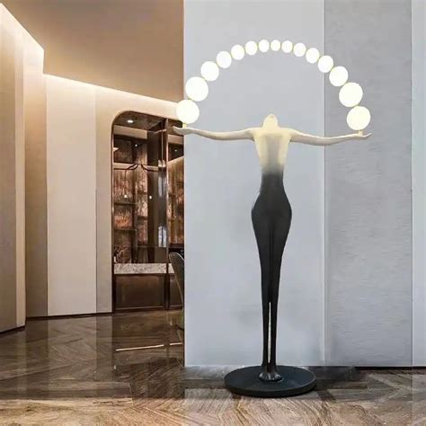 Designer Black White sculpture holding ball floor lamp – Stello Light ...