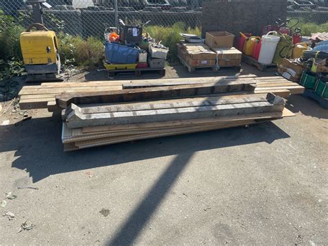 PALLET OF PLYWOOD SHEETS, WHITE PEGBOARD, & ASSORTED LENGTH 4X4 WOODEN ...