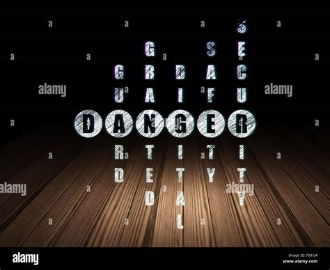 Safety concept: Danger in Crossword Puzzle Stock Photo - Alamy