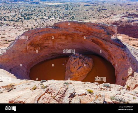 Photograph of the Cosmic Ashtray, a uniquely eroded sandstone formation ...