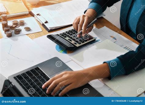 Woman Accountant Use Calculator and Computer on Desk in Office. Work for Safe at Home Stock ...
