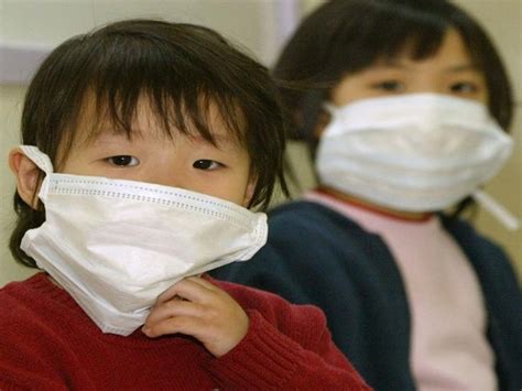 Struggling US manufacturers switch production lines to face masks