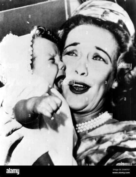 JOHN CLARK GABLE CHRISTENING + MOTHER KAY GABLE 12 JUNE 1961 Stock Photo - Alamy
