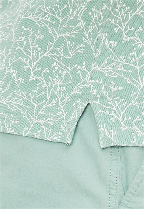 Buy Men Printed Slim Fit Polo T-shirt Online at just Rs. 699.0 ...