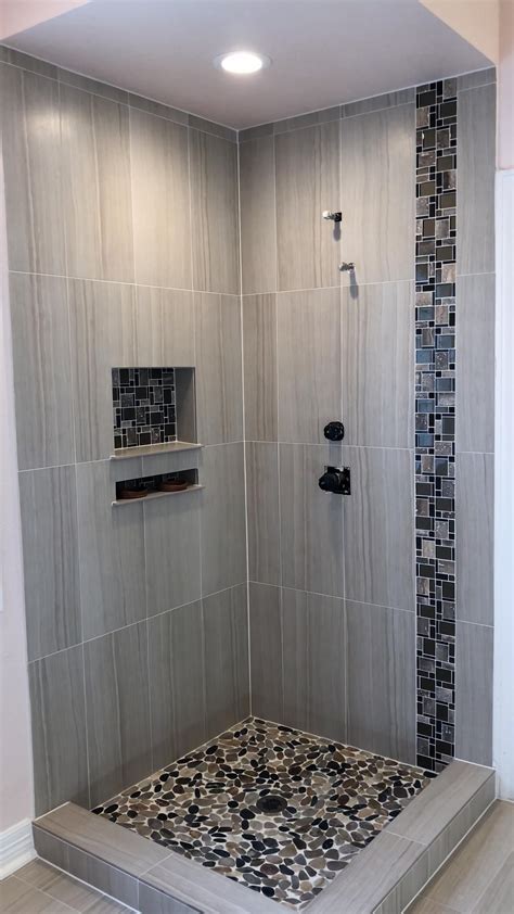 Complete Shower and Bathroom Floor Rebovation, we use light color tile ...