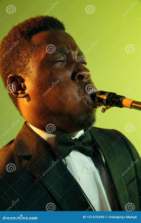 Young African-american Jazz Musician Playing the Saxophone Stock Photo ...
