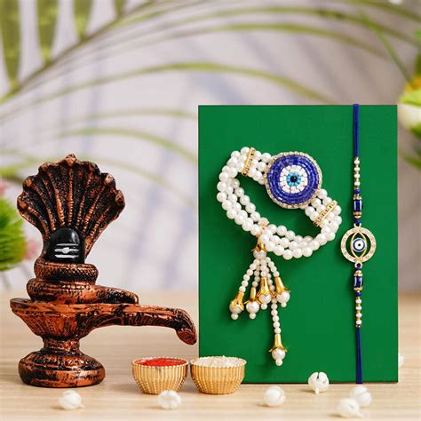 Webelkart Designer 2 Rakhi For Bhaiya Bhabhi With Shivling Statue Idol ...