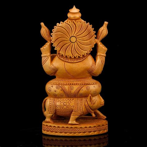 Shop Online Idol of Ganesha Sitting on Mooshak Mouse Wooden Statue ...