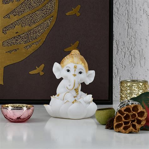 Buy Ganesha On Lotus Polyresin Showpiece (White & Gold) Online ...