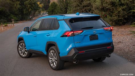 2019 Toyota RAV4 XLE Premium AWD (Color: Blue Flame) | Rear Three-Quarter