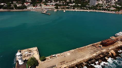 Aerial view of the landscape with the sea and the embankment of Yalta ...