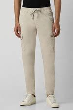 Buy Men Beige Solid Crop Fit Trousers Online - 39728160 | Van Heusen