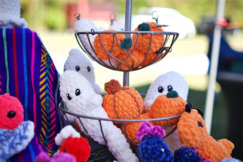 A basket filled with stuffed animals sitting on top of a table photo ...