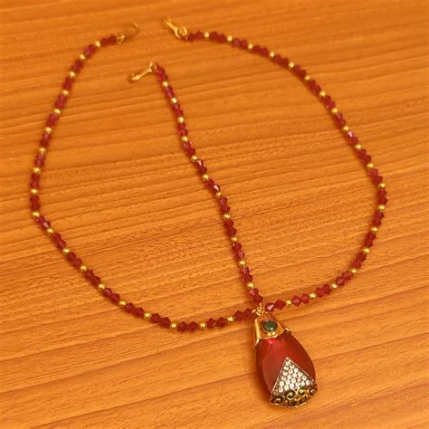 RED STONE CRYSTAL LOOK WEDDING MAANG TIKKA – Sanvi Jewels