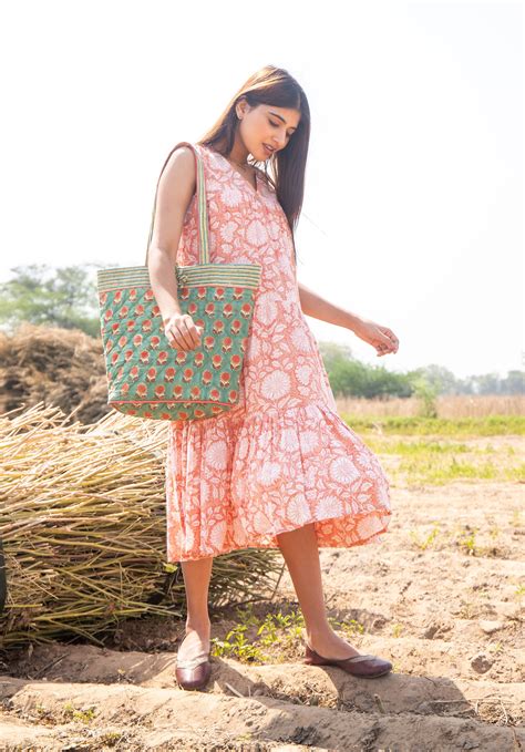 Women Tiered dress Nirmala Floral Peach