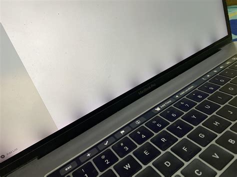 I use a 2016 15' MBP, the display has some weird black thing at the ...