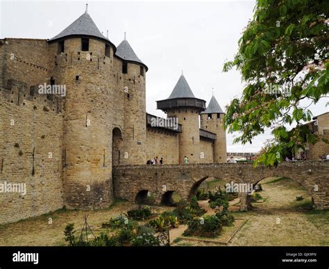 Carcassonne, entrance bridge to the Chateau Comtal castle. Languedoc ...